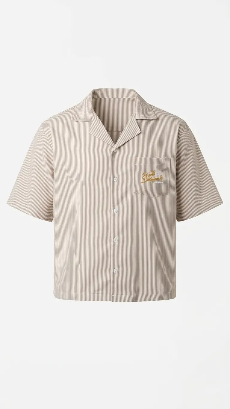 A short-sleeve button-up shirt in beige with subtle vertical pinstripes and a small embroidered logo on the left chest pocket, displayed on a clean white background.